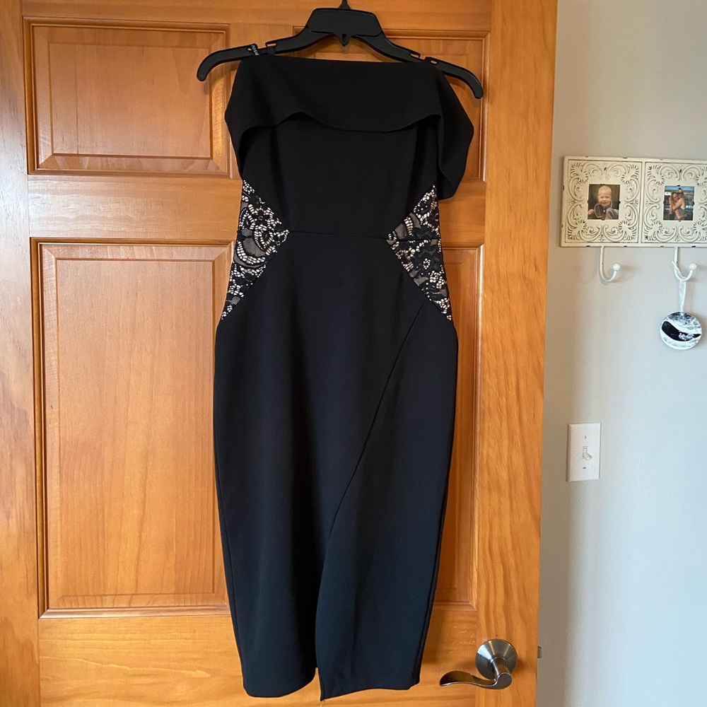 Off shoulder black dress with lace detail